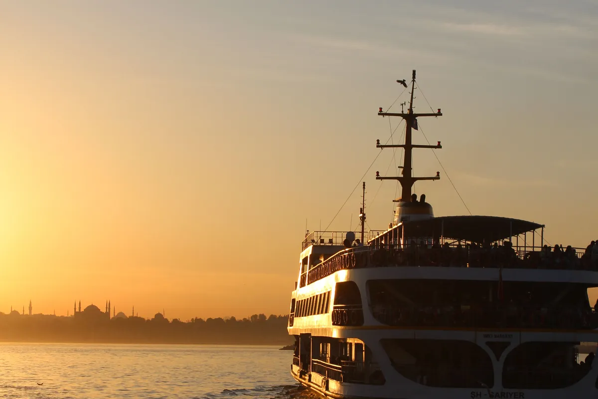 Ferry crossing the Bosphorus in Istanbul at sunset